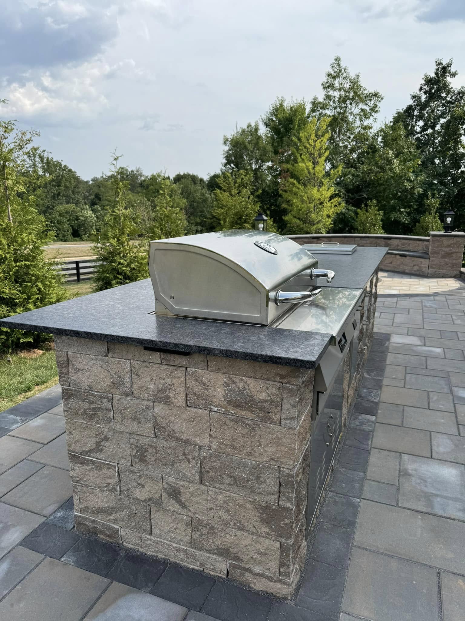 Outdoor kitchen stone island — Blue Lightning Decks & Patios